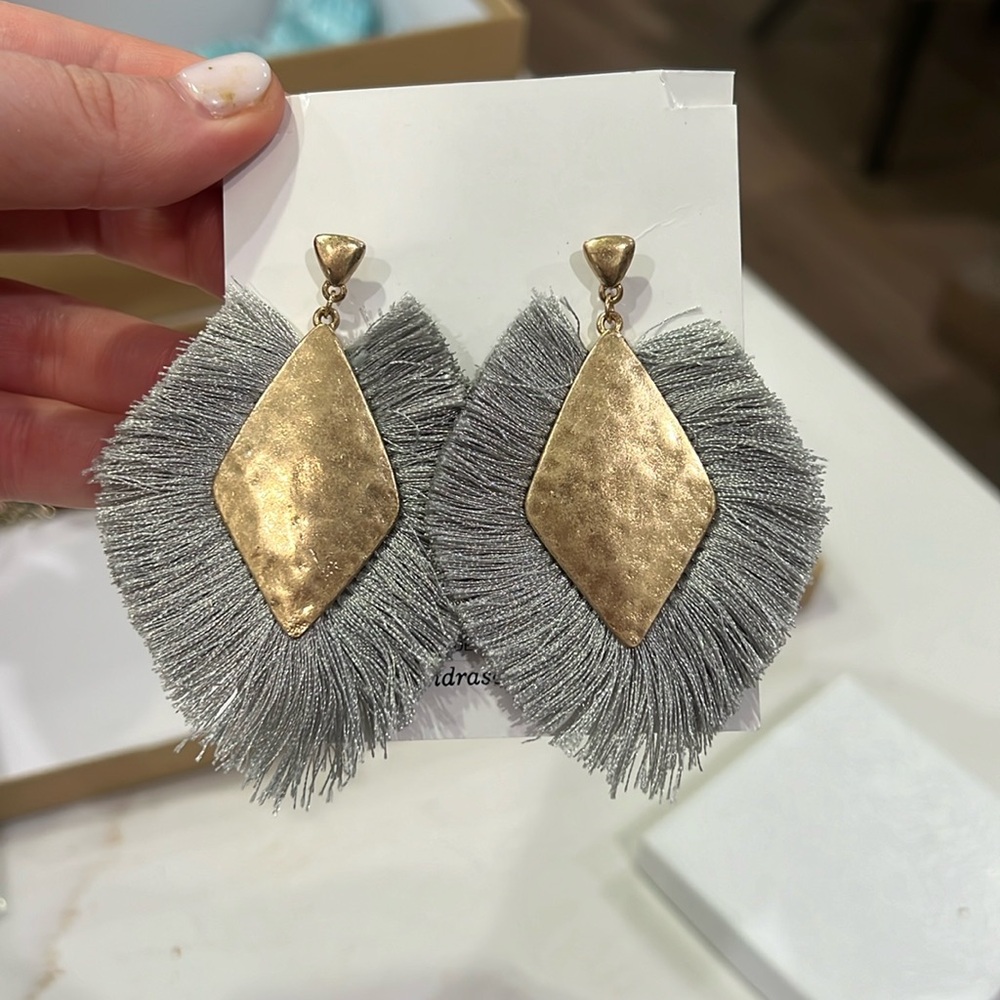Impeccable pig gold tassel earrings